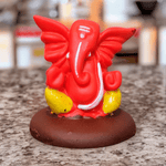 Resin Ganesha Murti Idol Statue Sculpture - 5cm x 5cm Saffron Colour with Brown Platform | Miniature Divine Decor - Divinesansar
