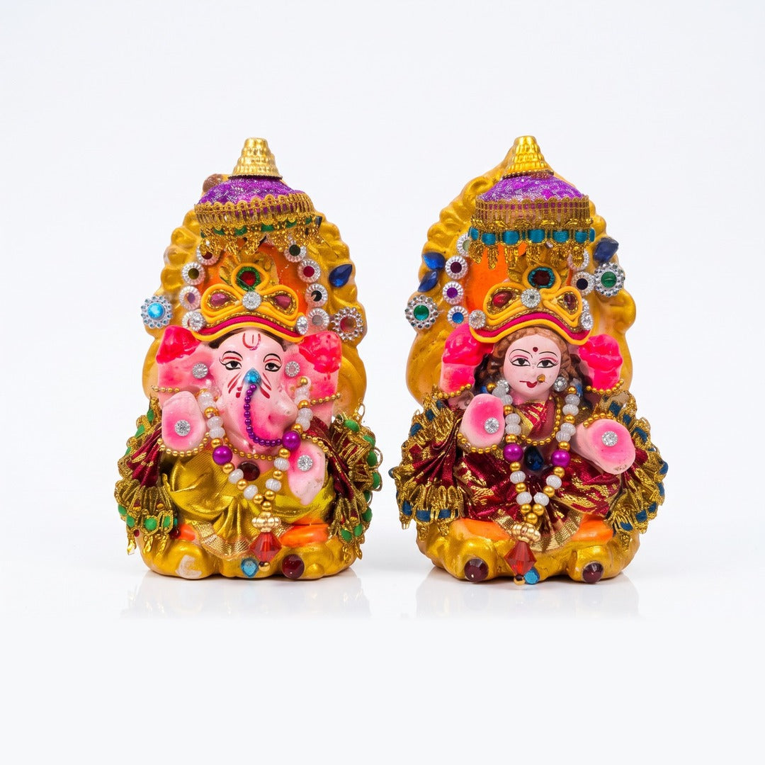 Decorated clay Laxmi Ganesh idol pair for Diwali pooja, 10 cm each, on white - Divine Sansar