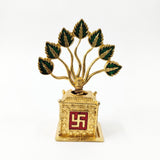 Golden metal Tulsi plant with green enamel leaves and Swastik base - Divine Sansar