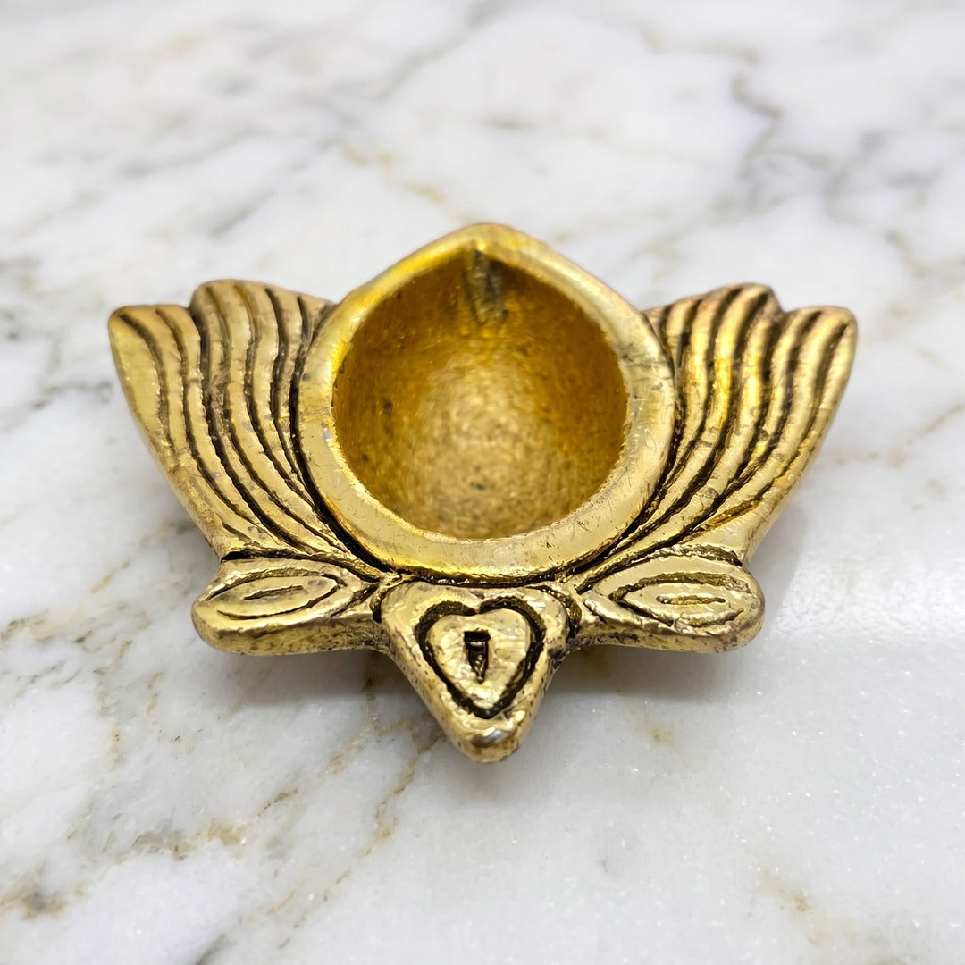 Pure brass Kamal Diya lotus diya with antique gold finish on white marble - Divine Sansar