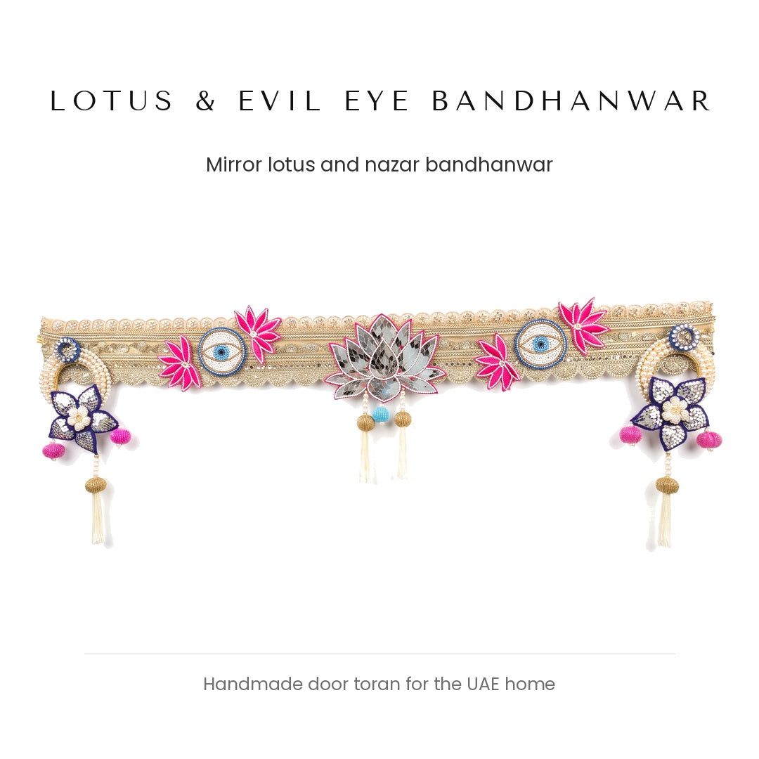 Lotus and evil eye bandhanwar with mirror work on a gold lace band by Divine Sansar