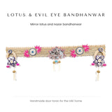 Lotus and evil eye bandhanwar with mirror work on a gold lace band by Divine Sansar