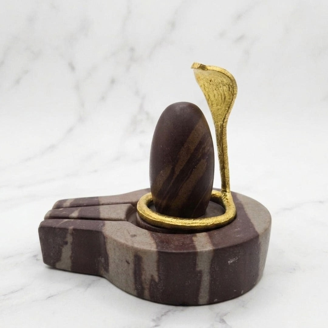 Narmadeshwar Shivling with natural stone peetham and brass naga, white marble - Divine Sansar