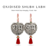 Oxidised silver-finish Shubh Labh door hanging pair with red tassel - Divine Sansar