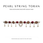 Woven pearl door toran with maroon roses and kundan motifs by Divine Sansar