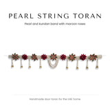 Woven pearl door toran with maroon roses and kundan motifs by Divine Sansar