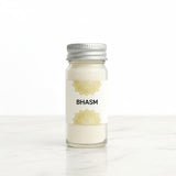 Vibhuti Thiruneeru sacred bhasm ash in a 5 cm glass jar on white marble - Divine Sansar