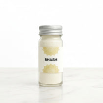 Vibhuti Thiruneeru sacred bhasm ash in a 5 cm glass jar on white marble - Divine Sansar