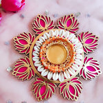 Pink lotus cut-work diya platter with cowrie ring styled for Diwali - Divine Sansar