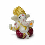 Small Ganesh idol 6 cm with red dhoti and gold crown, hand-painted polyresin Ganesha murti - Divine Sansar