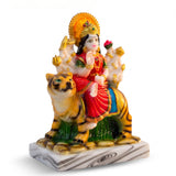 Side view of Durga Maa murti on her tiger showing the painted stripes and red saree - Divine Sansar