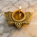 Brass lotus Kamal Diya lit with ghee and cotton wick - Divine Sansar