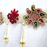 Kundan motif in green, red and gold on the Divine Sansar pearl toran band