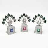 Silver metal Tulsi plants with blue, red and green Swastik base - Divine Sansar