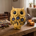 Evil eye owl statue on a study desk as home decor - Divine Sansar