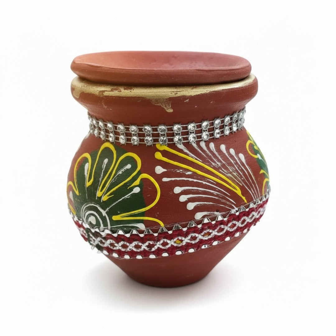Close-up of hand-painted mitti karwa pot with lid - Divine Sansar