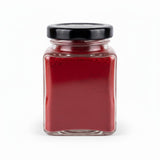 Deep red natural kumkum powder filling a 100g glass jar - Divine Sansar