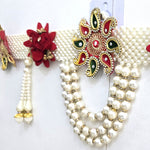 Triple pearl centre loop and gold capped tassels on the Divine Sansar pearl toran