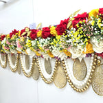 Pearl and antique gold bead swags below the rose bank on the Divine Sansar toran
