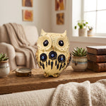 Off white Lakshmi owl figurine on a living room shelf - Divine Sansar