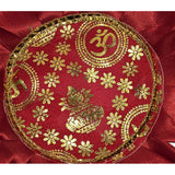 Close-up of the gold Om, Shri and Kalash print on the Divine Sansar Kamal Aasan centre disc