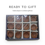 Twelve plain clay diyas in a window gift box for Diwali - Divine Sansar