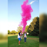 Girl gender reveal pink powder cannon outdoors - Divine Sansar UAE