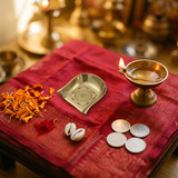 Brass Shree Yantra soop on red silk for Lakshmi Puja with diya, cowrie shells and dirham coins - Divine Sansar