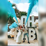 Boy gender reveal blue powder blaster celebration - Divine Sansar UAE