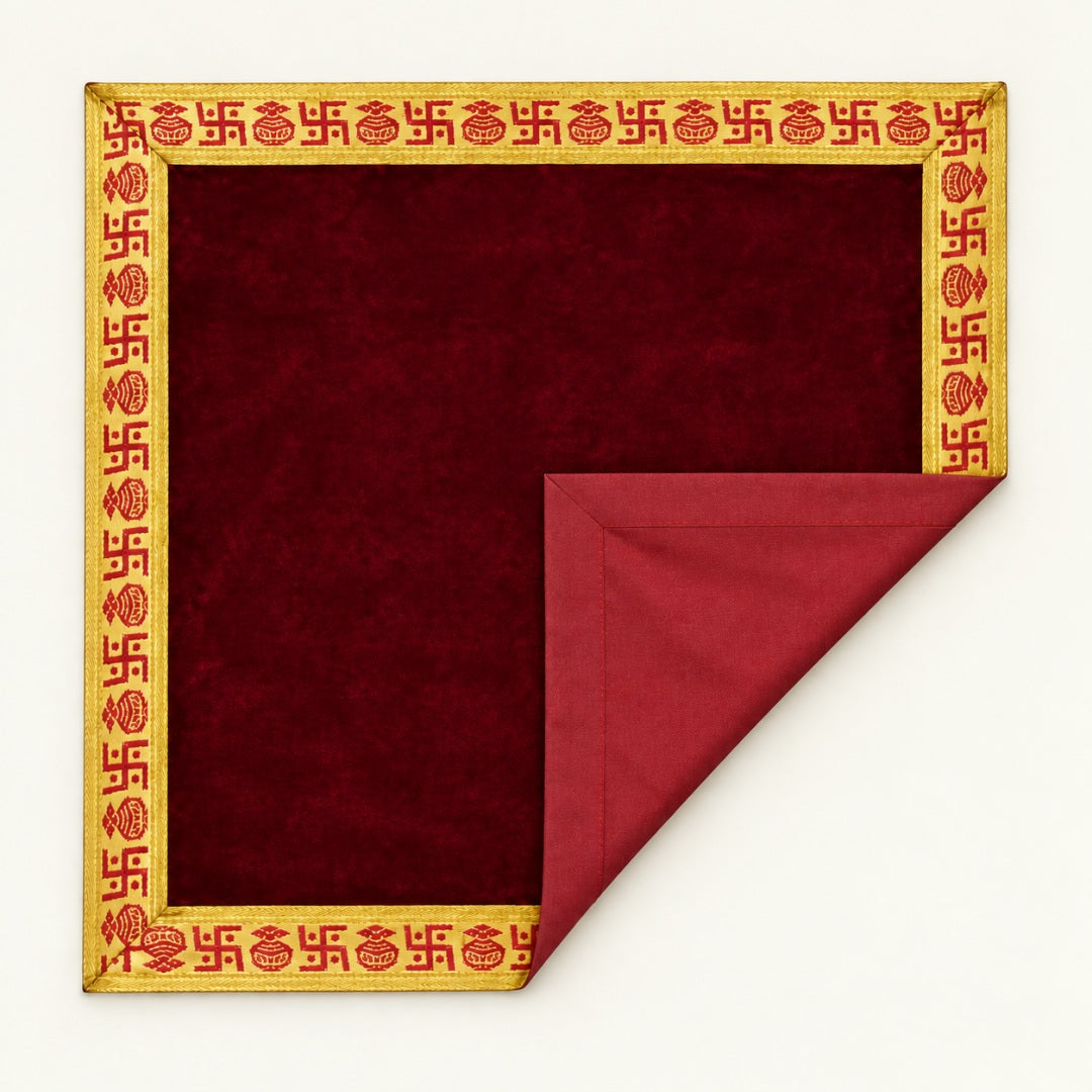 Maroon velvet pooja aasan folded to show the matching cotton back - Divine Sansar