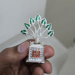Silver metal Tulsi plant held in hand to show its true 5 cm size - Divine Sansar