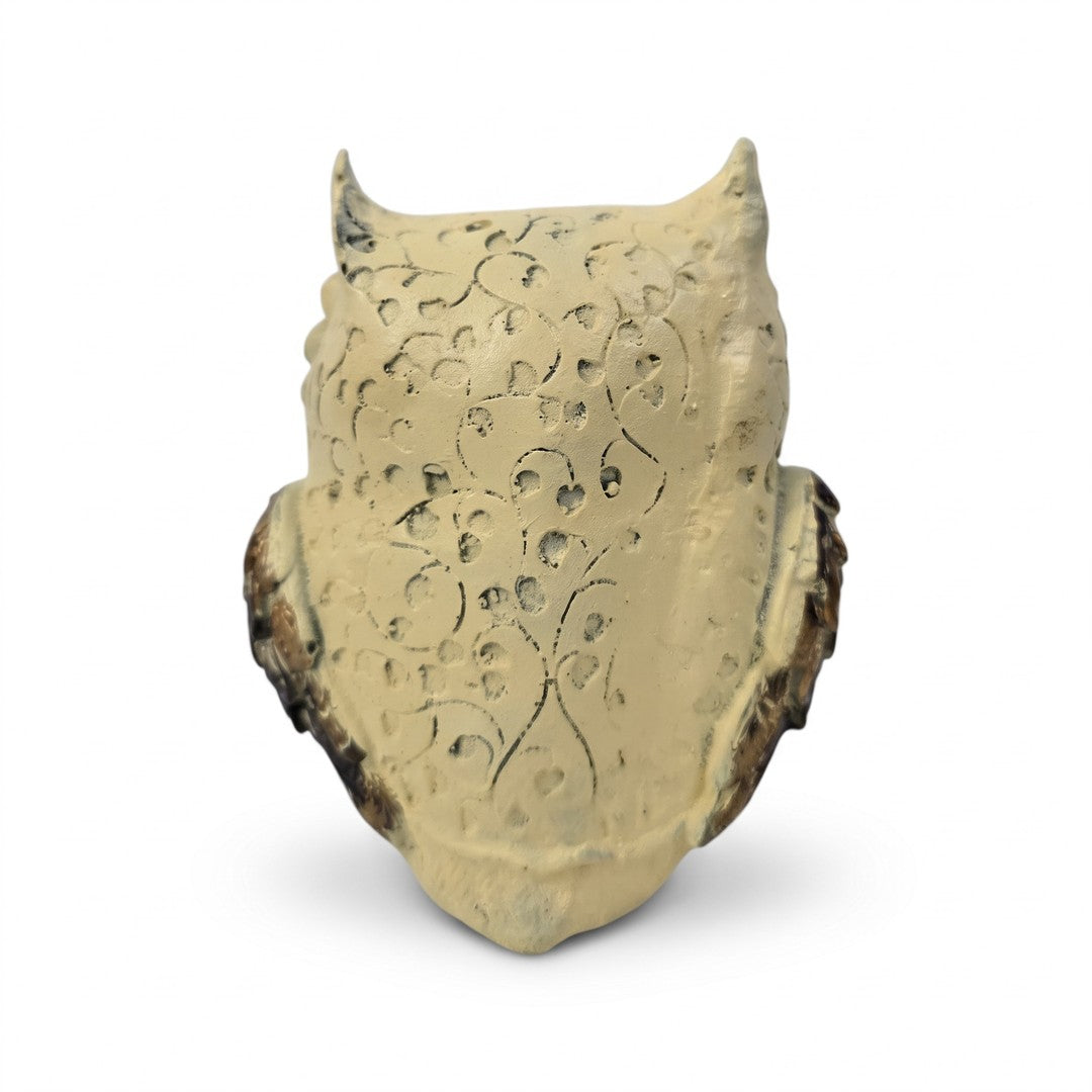 Back of off white evil eye owl statue showing carved scroll pattern - Divine Sansar