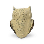 Back of off white evil eye owl statue showing carved scroll pattern - Divine Sansar