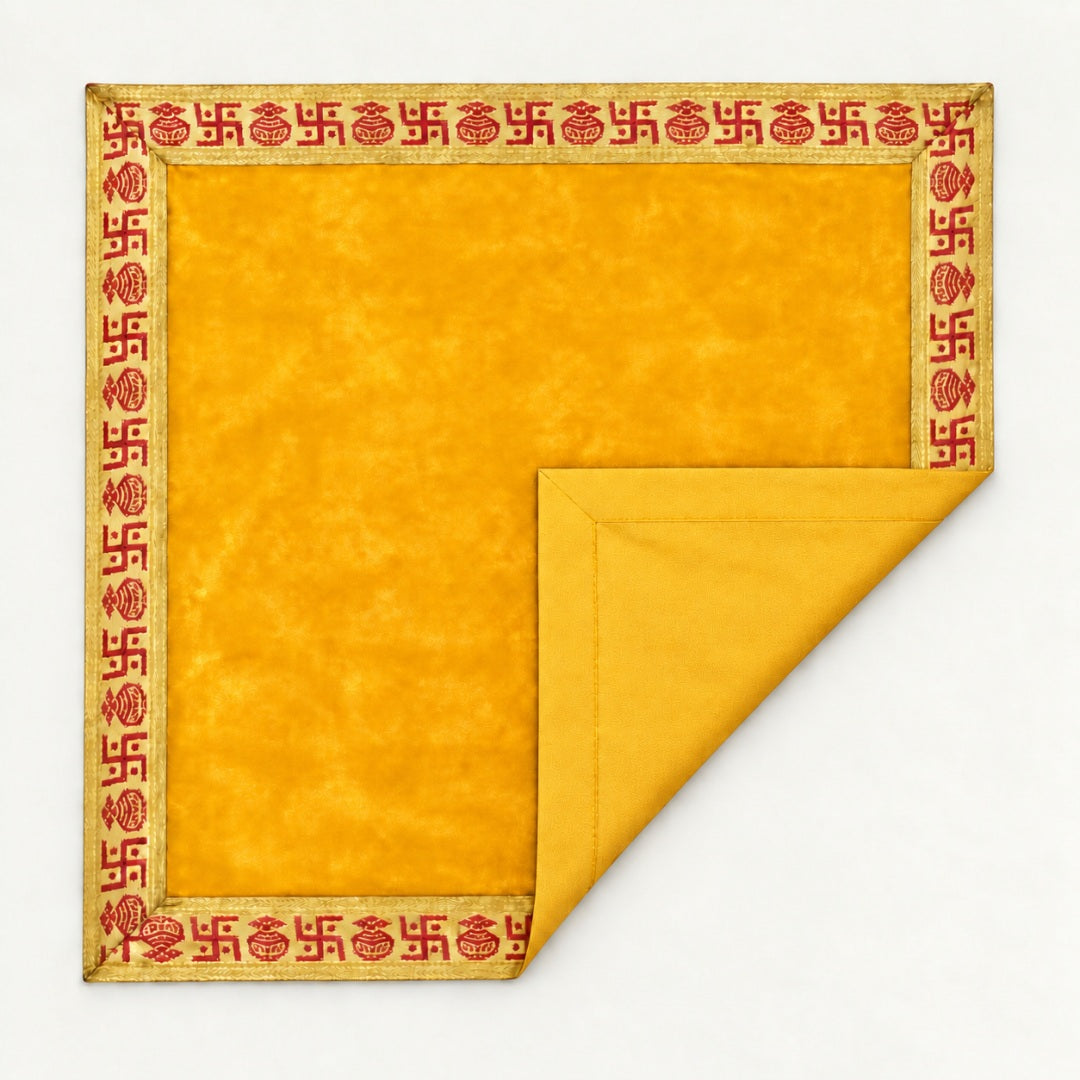 Yellow velvet pooja aasan folded to show the matching cotton back - Divine Sansar