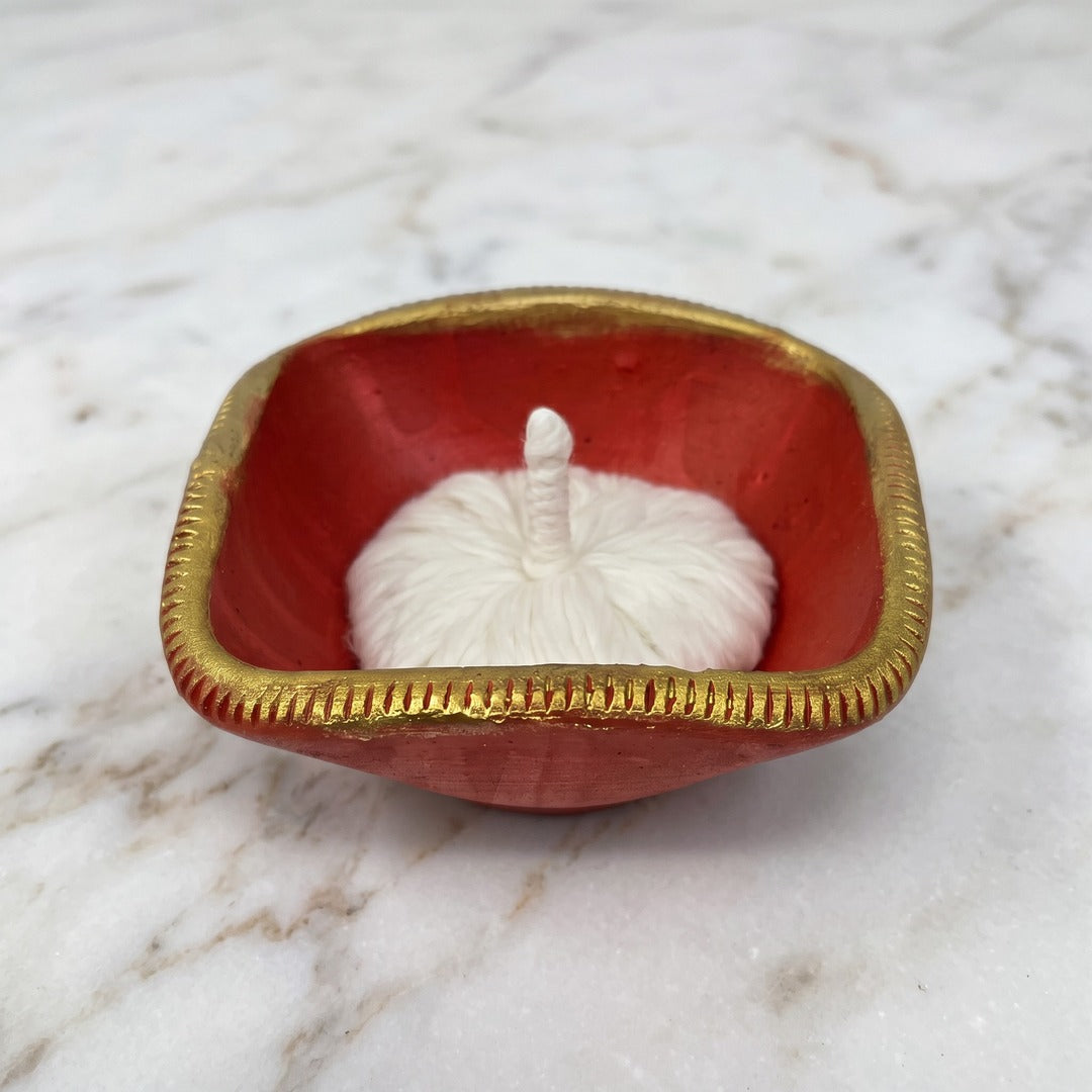365 batti set in the centre of a chaumukhi diya before lighting - Divine Sansar
