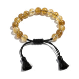 Small citrine bead bracelet on black braided cord with tassels - Divine Sansar