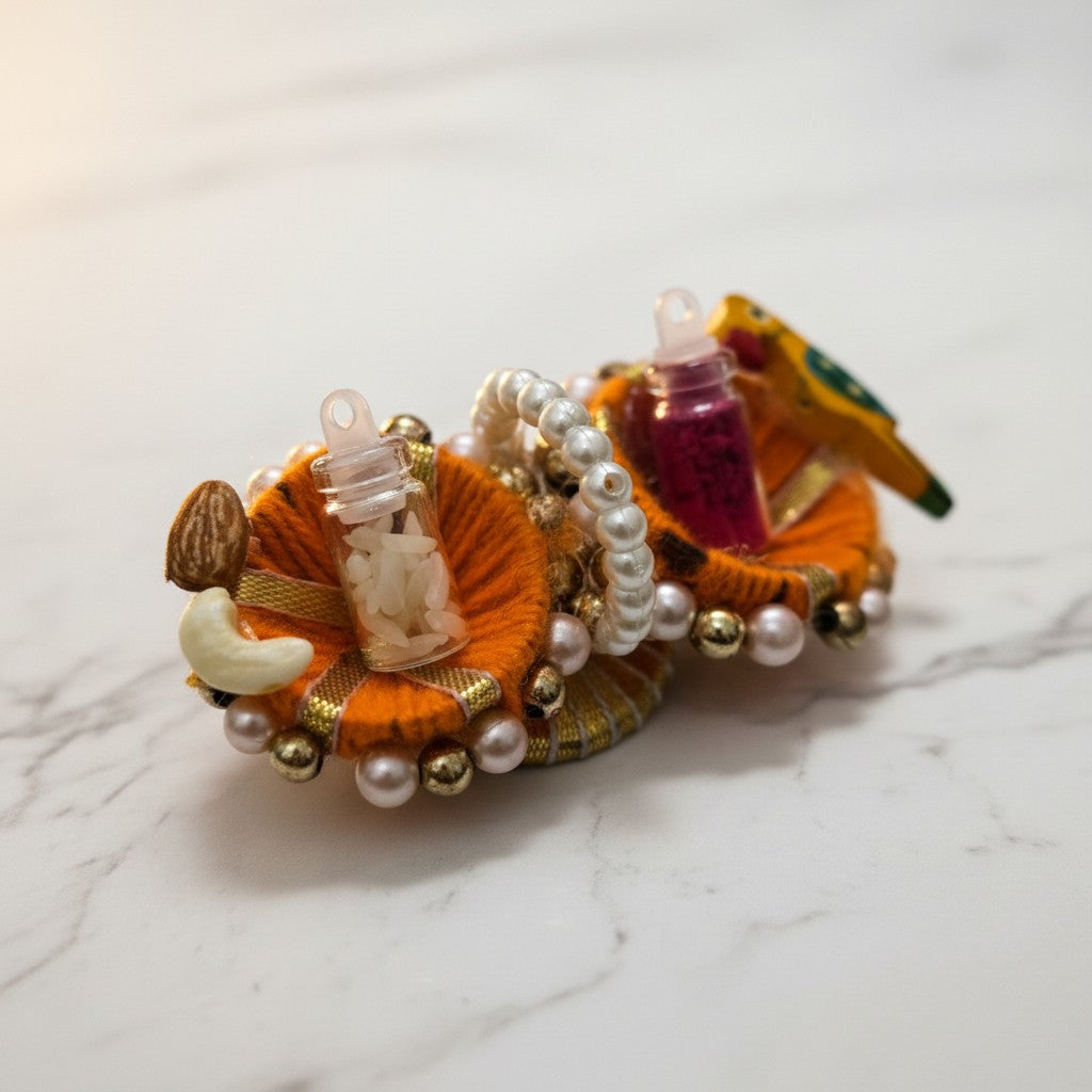 Marigold kumkum set with roli and akshat vials and parrot charm, Divine Sansar
