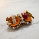 Marigold kumkum set with roli and akshat vials and parrot charm, Divine Sansar