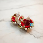 Red kumkum set with roli and akshat vials and bird charm, Divine Sansar