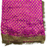 Purple scarf with gold pattern on a white background