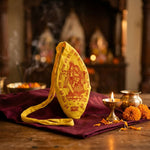 Gomukhi japa mala bag on a pooja altar with brass diya and marigold flowers - Divine Sansar