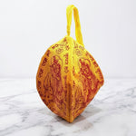 Side view of yellow Gomukhi cotton bead bag with carry loop - Divine Sansar