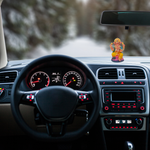 Divine Sansar-Divine Ganesha Statue-Car interior with dashboard lights on and Ganesha statue on the dashboard.