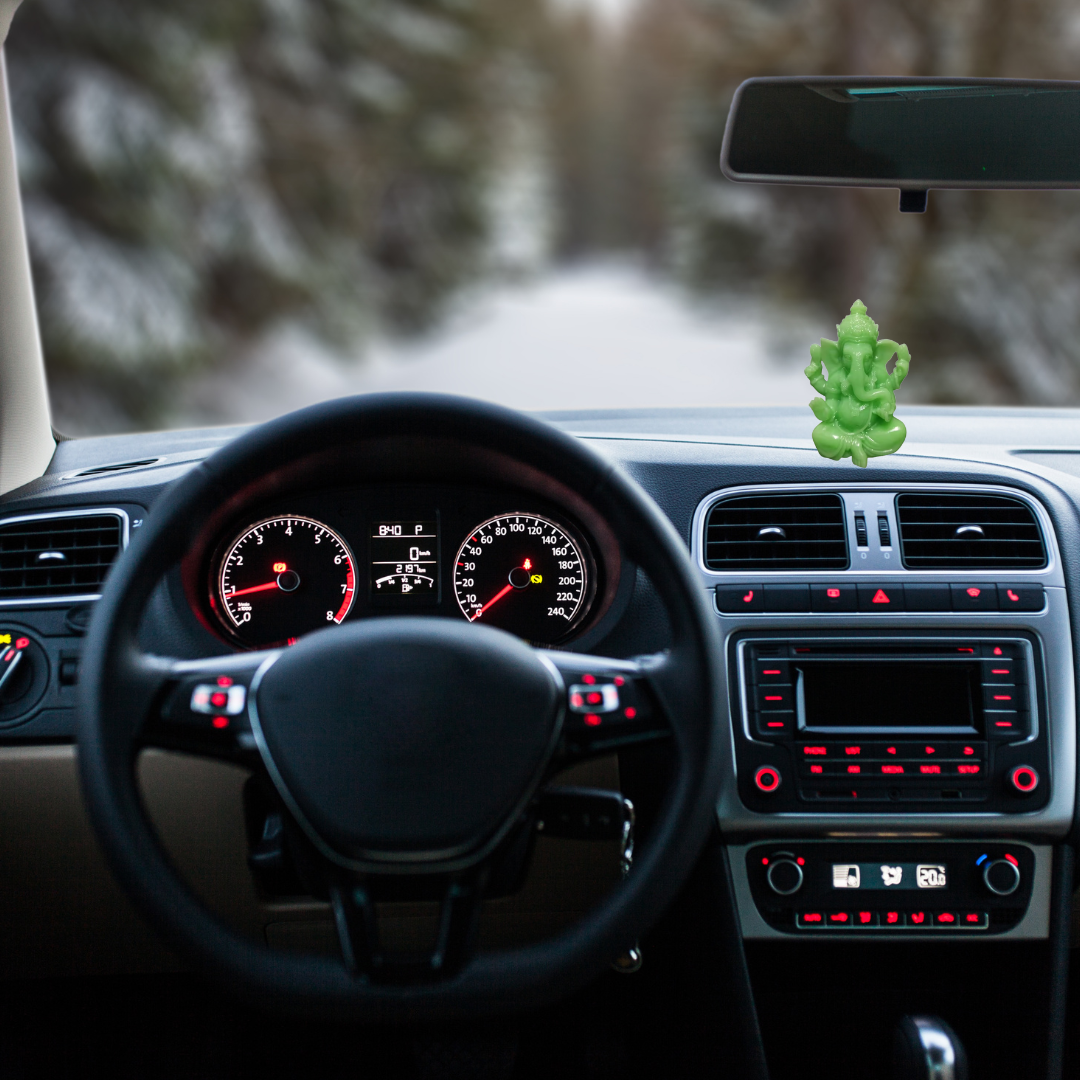 Divine Sansar-Glow in Dark Ganesha Statue-Car interior with a Glow in Dark Ganesha Statue on the dashboard