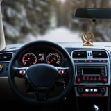 Divine Sansar-Golden Khanda Sahib Idol with Sparkling Stones-Car interior with dashboard and steering wheel, blurred road in the background