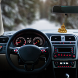 Divine Sansar-Golden Lord Hanuman Idol-Car interior with dashboard and steering wheel, featuring Golden Lord Hanuman Idol on the dashboard.