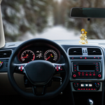 Divine Sansar-Hanumanji Statue in White & Gold-Car interior with dashboard lights on, steering wheel, and Hanumanji Statue in White & Gold on the dashboard.
