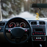 Divine Sansar-Hanumanji Statue in White & Gold-Car interior with dashboard lights on, steering wheel, and Hanumanji Statue in White & Gold on the dashboard.
