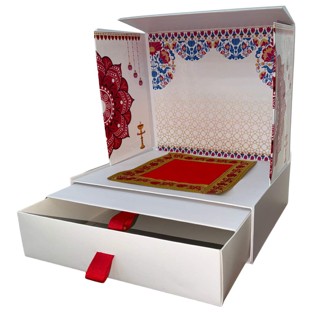 Divine Sansar-Mangal Bhawan : Personal Portable Temple-Decorative box with colorful patterns and a red ribbon on a white background