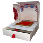 Divine Sansar-Mangal Bhawan : Personal Portable Temple-Decorative box with colorful patterns and a red ribbon on a white background